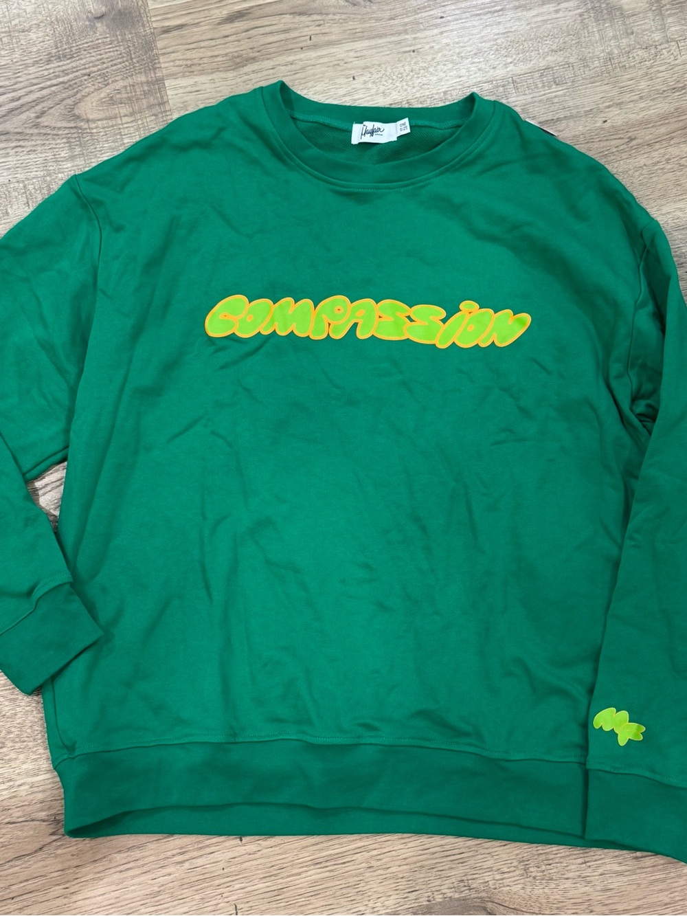 Green 'COMPASSION' Crewneck Sweater